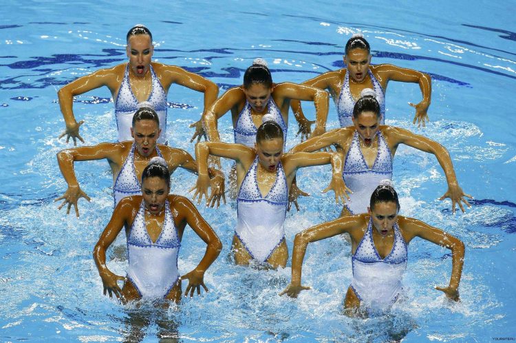 Sync and Giggle: A Whimsical Collection of Synchronized Swimming Photos