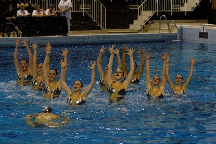 Sync and Giggle: A Whimsical Collection of Synchronized Swimming Photos