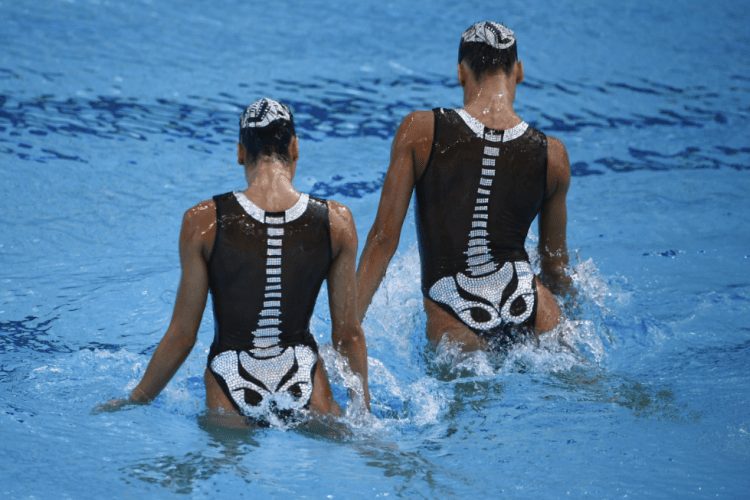 Sync and Giggle: A Whimsical Collection of Synchronized Swimming Photos