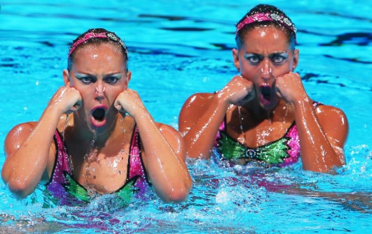 Sync and Giggle: A Whimsical Collection of Synchronized Swimming Photos