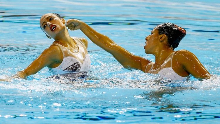 Sync and Giggle: A Whimsical Collection of Synchronized Swimming Photos