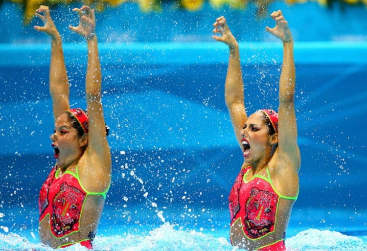 Sync and Giggle: A Whimsical Collection of Synchronized Swimming Photos